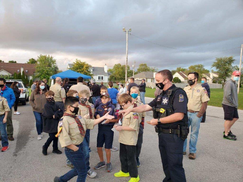 Officer Ben Young with boy scouts